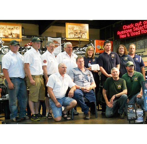 Open Road Harley Davidson and Muskegon Motorcycle Gang award presented to Mt. Calvary Ambulance and Fire Department